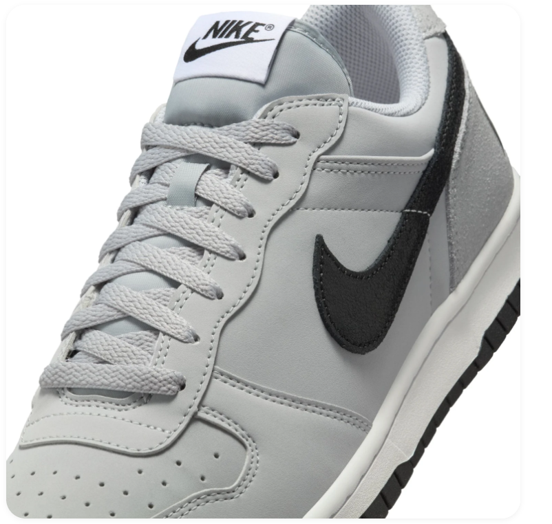 Nike Light Grey Low-Top Sneakers with Black Swoosh and Oversized Heel Branding