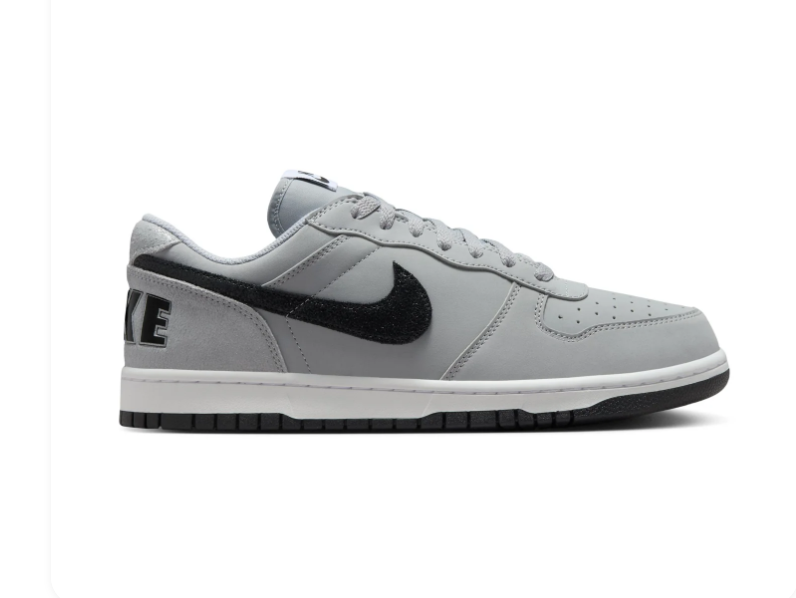 Nike Light Grey Low-Top Sneakers with Black Swoosh and Oversized Heel Branding