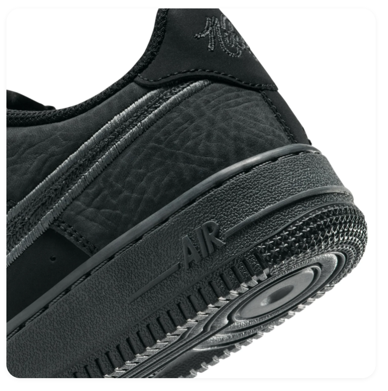 Nike Air Force 1 Black and Charcoal Low-Top Sneakers with Grey-Outlined Swoosh