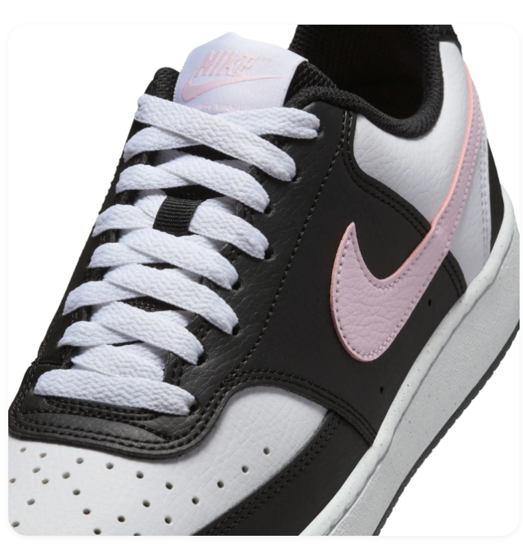Nike Black and White Low-Top Sneakers with Pink Swoosh