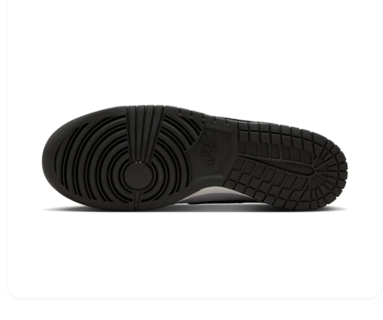 Nike Light Grey Low-Top Sneakers with Black Swoosh and Oversized Heel Branding