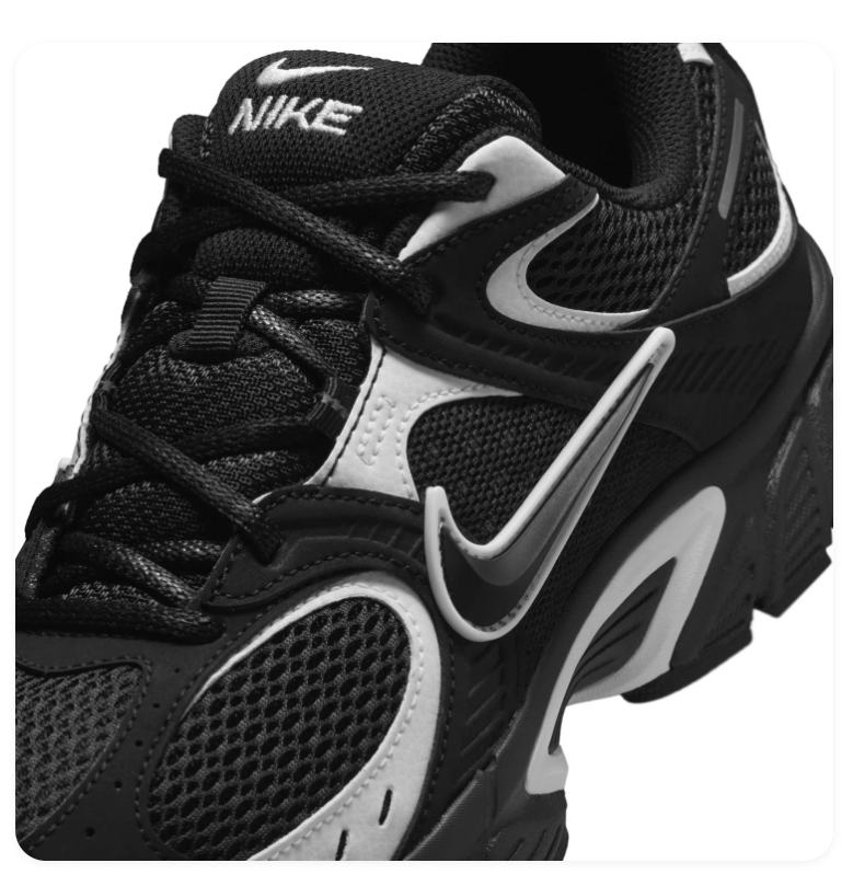 Nike Black and Silver Low-Top Sneakers with Sculpted Sole