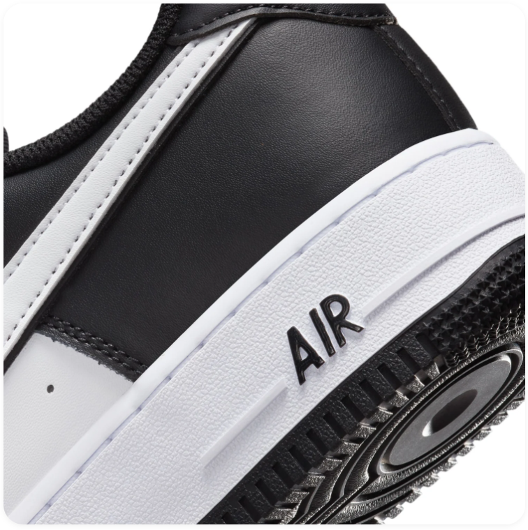 Nike Air Force 1 Black and White Low-Top Sneakers with Outlined Swoosh