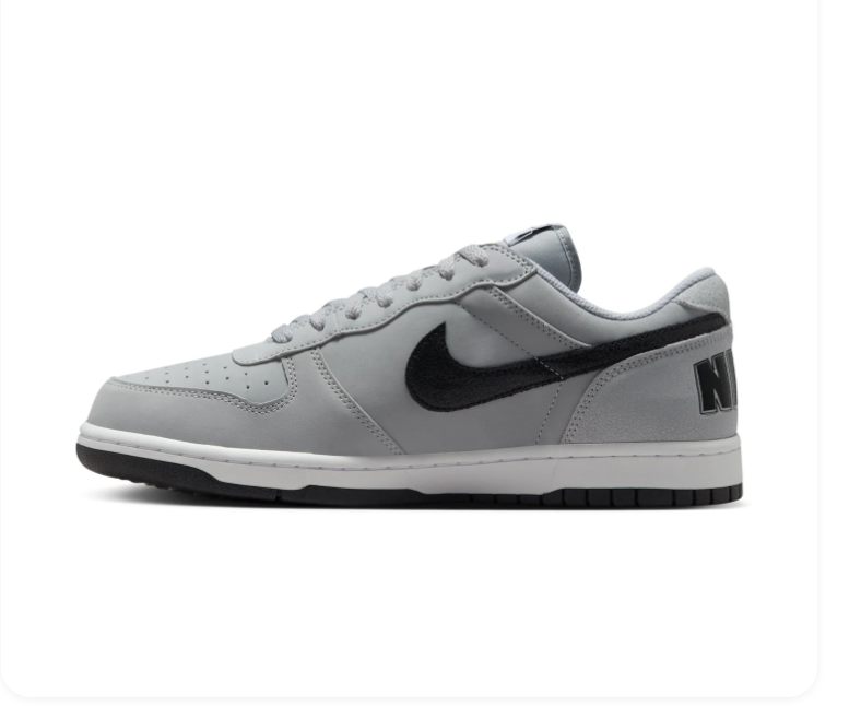 Nike Light Grey Low-Top Sneakers with Black Swoosh and Oversized Heel Branding