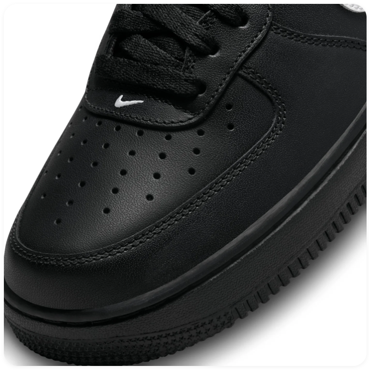 Nike Air Force 1 Black Low-Top Sneakers with White Swoosh