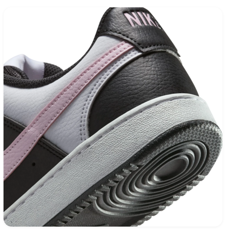 Nike Black and White Low-Top Sneakers with Pink Swoosh